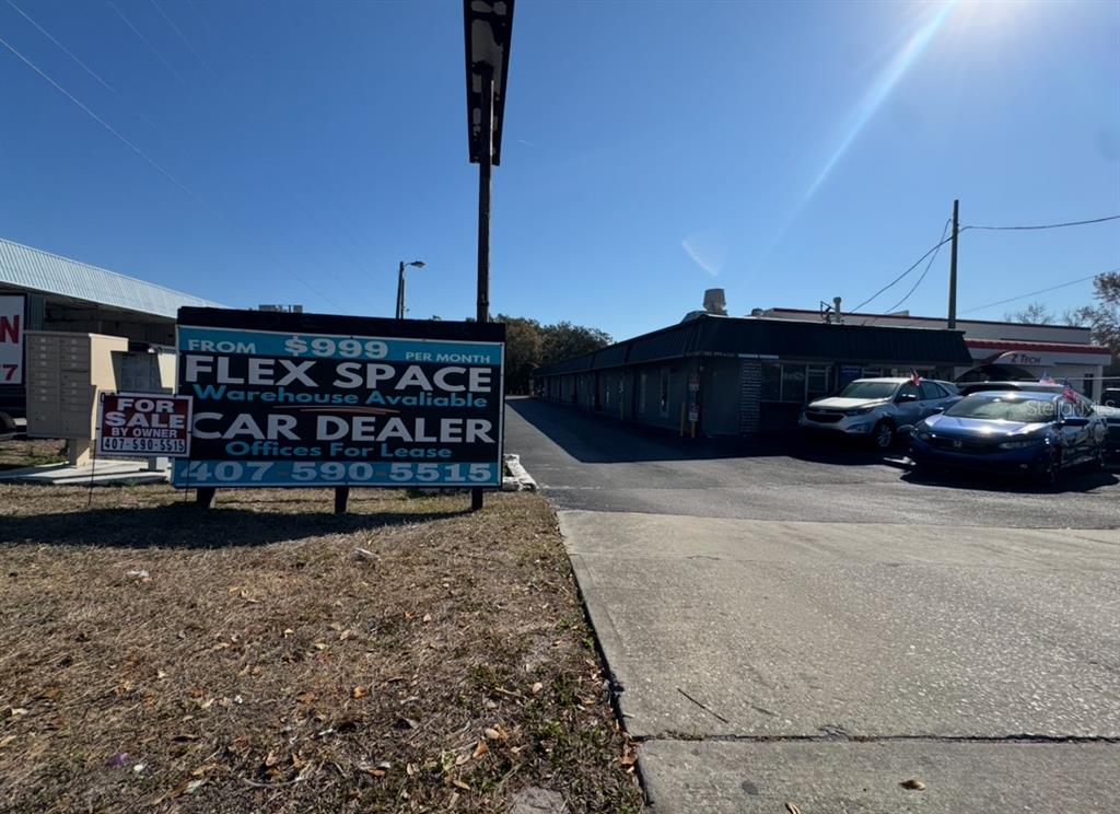A commercial property sign stands in front of a low-rise building with a parking lot — 531 N US HIGHWAY 17 92, LONGWOOD, FL