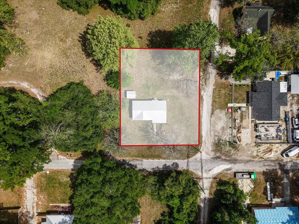 An aerial view shows a house and a small shed on a rectangular lot — 23832 NW 183RD ROAD, HIGH SPRINGS, FL