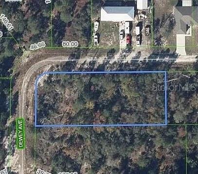 This is an aerial map view of a vacant, rectangular residential lot — 5025 DEWEY AVENUE, SEBRING, FL