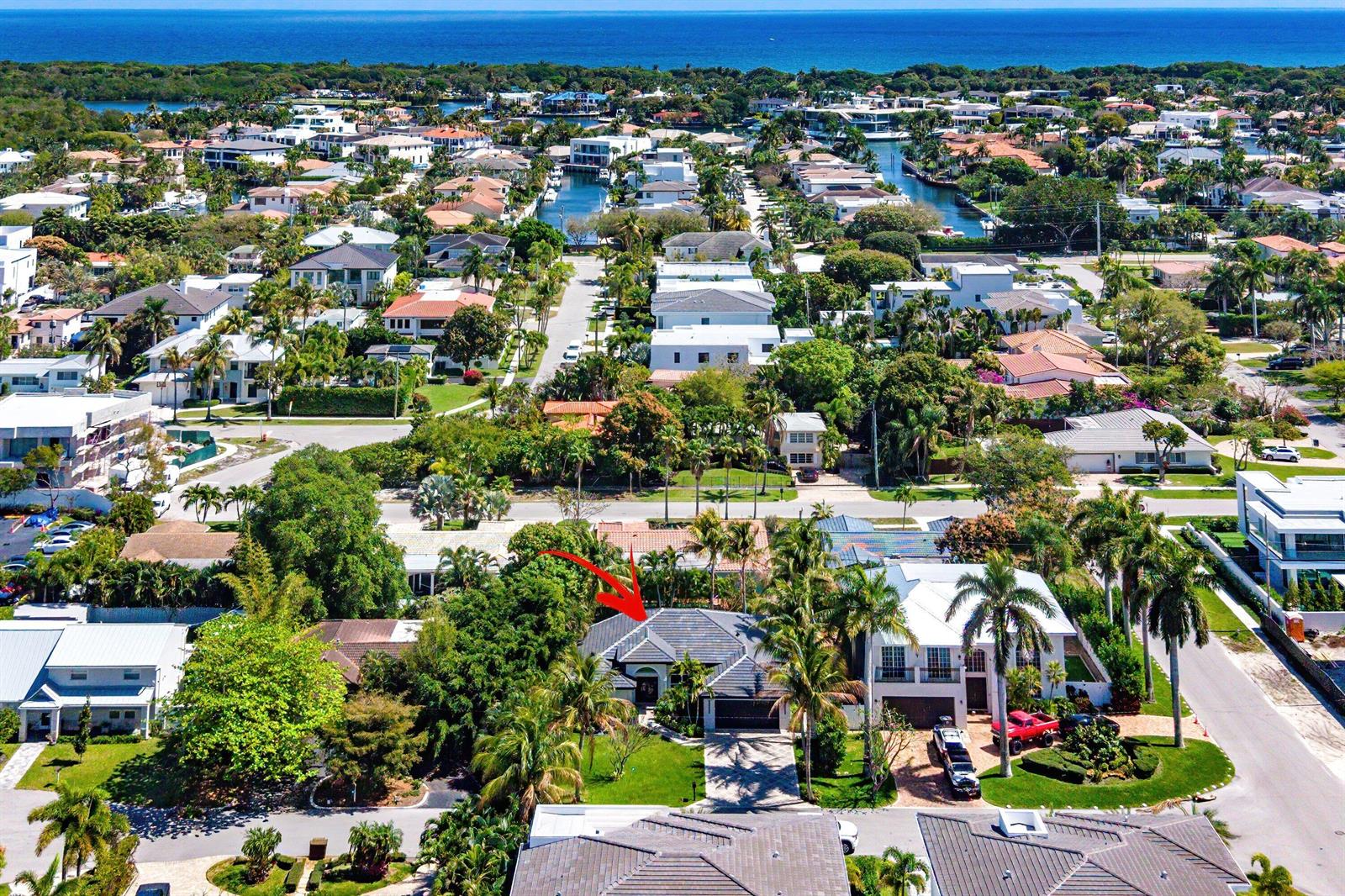 An aerial view of a residential neighborhood featuring a house with a grey tiled roof — 1132 NE 3rd Avenue, Boca Raton FL 33432, BOCA RATON, FL