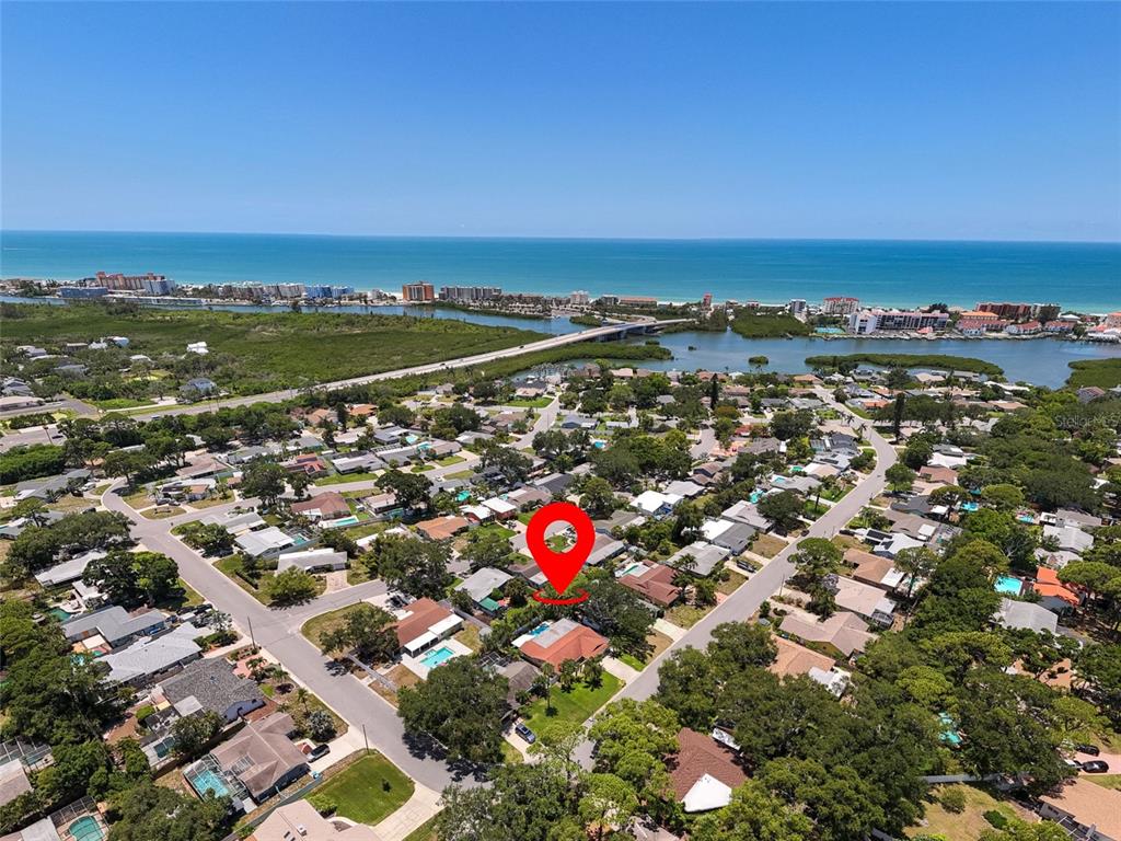 An aerial view shows a residential neighborhood with a red location pin over a house — 14060 82ND AVENUE, SEMINOLE, FL