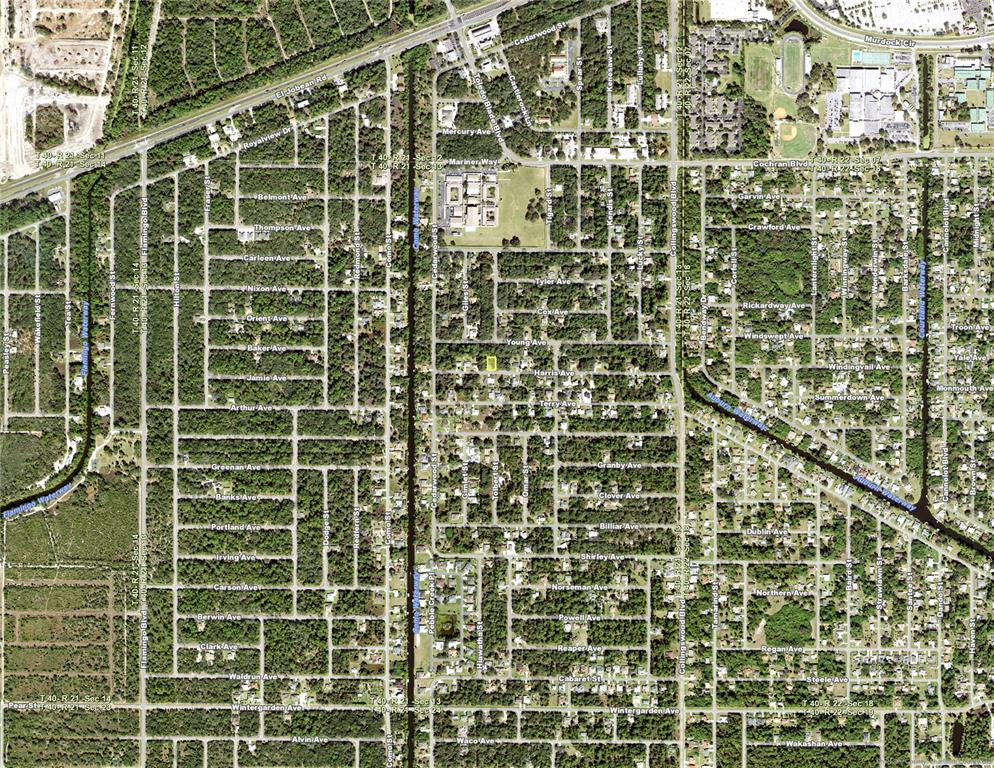 This is an aerial map showing a residential neighborhood with a highlighted property lot — 17344 HARRIS AVENUE, PORT CHARLOTTE, FL