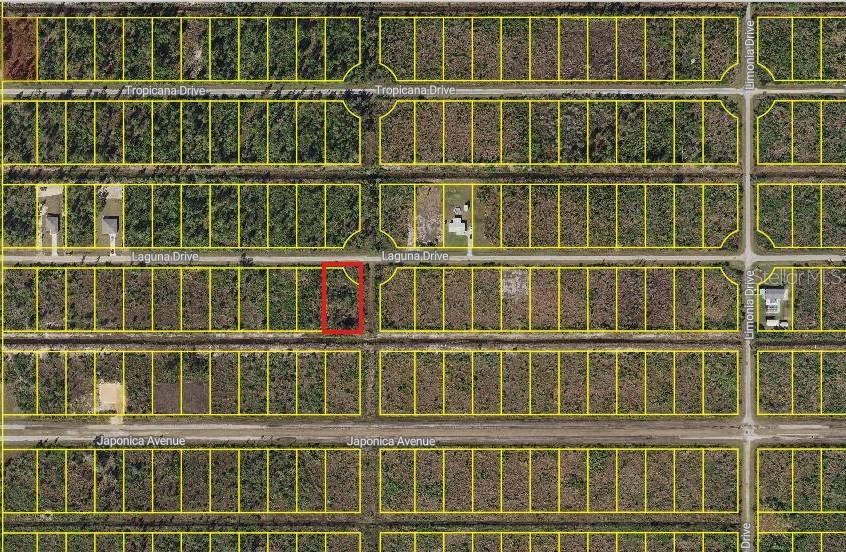 This is an aerial map showing a vacant rectangular lot outlined in red — 0 LAGUNA DRIVE, INDIAN LAKE ESTATES, FL