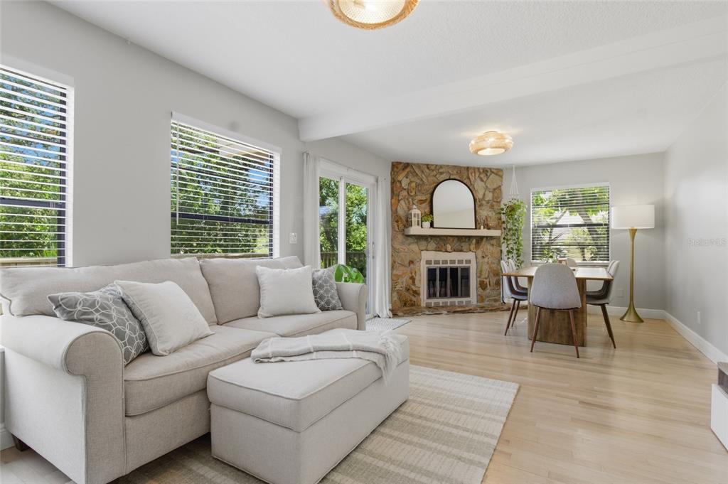 A wooden door with a number one sits on a covered porch with light-colored decking — 304 16TH AVENUE N, ST PETERSBURG, FL
