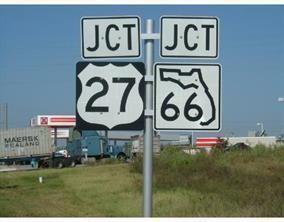 A road sign indicates a junction for U.S. Route 27 and Florida State Road 66 — 5904 Quince Road, Sebring FL 33875, SEBRING, FL