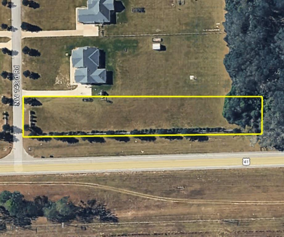 This aerial map shows a rectangular vacant lot bordered by a road and trees — 0 NW 143RD ROAD, HIGH SPRINGS, FL