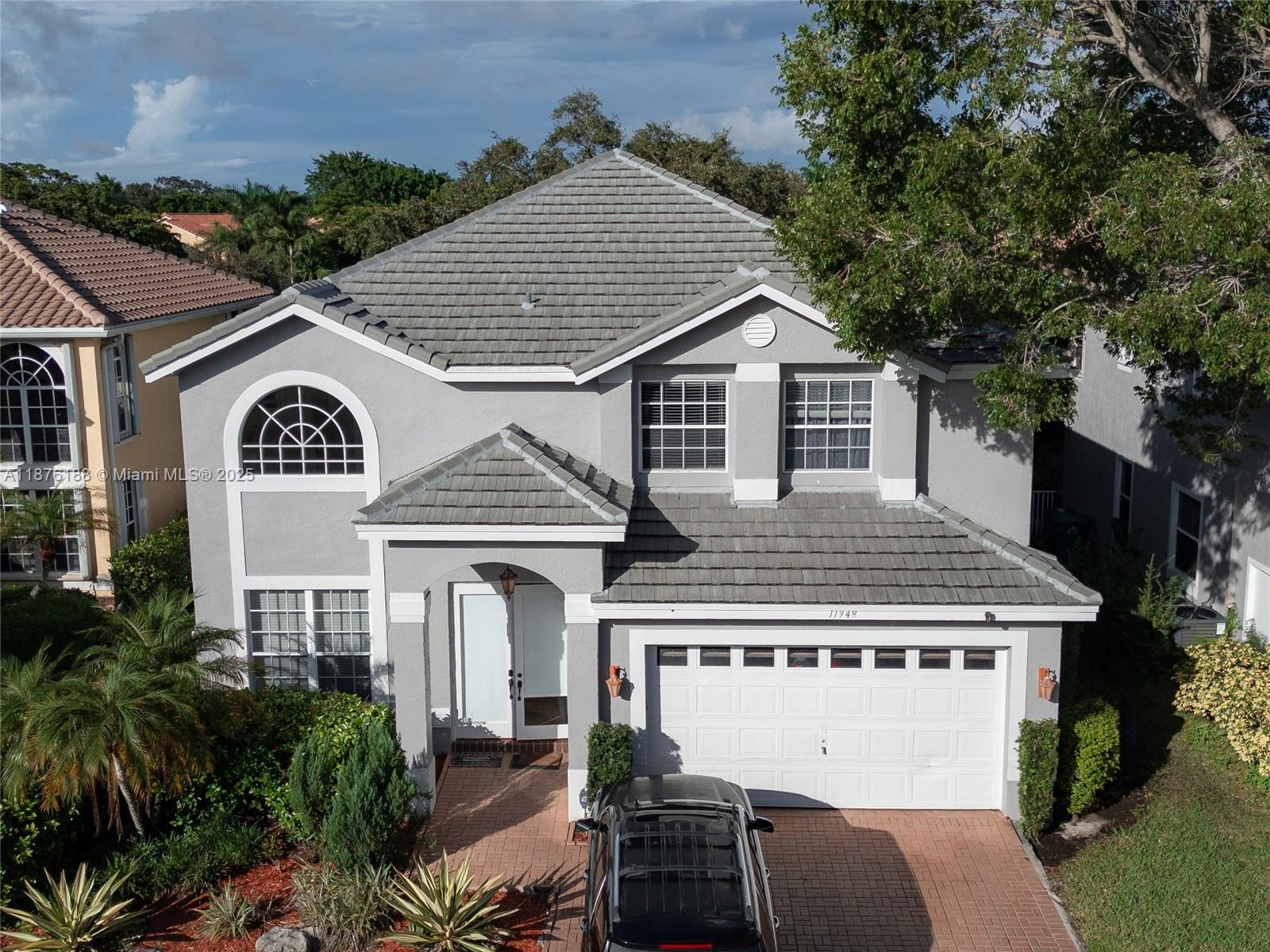 11948 Glenmore Dr, Coral Springs FL 33071