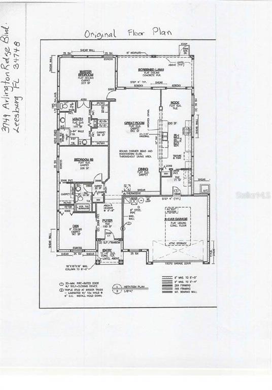 A single-story house with a two-car garage, stone accents, and a front lawn with trees — 3749 ARLINGTON RIDGE BOULEVARD, LEESBURG, FL