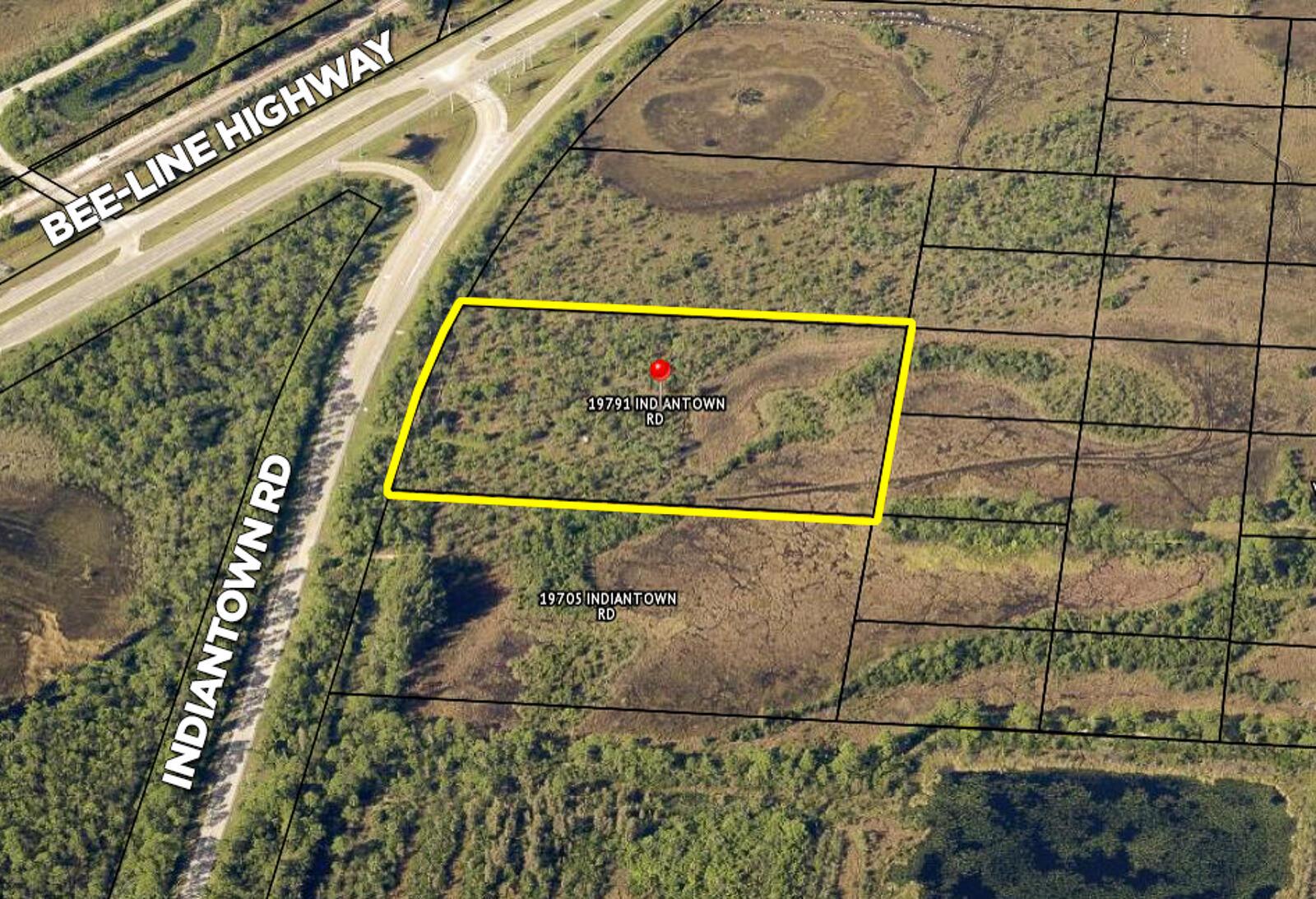 This aerial map shows a rectangular plot of land outlined in yellow near a highway — 19791 Indiantown Road, Jupiter FL 33478, JUPITER, FL