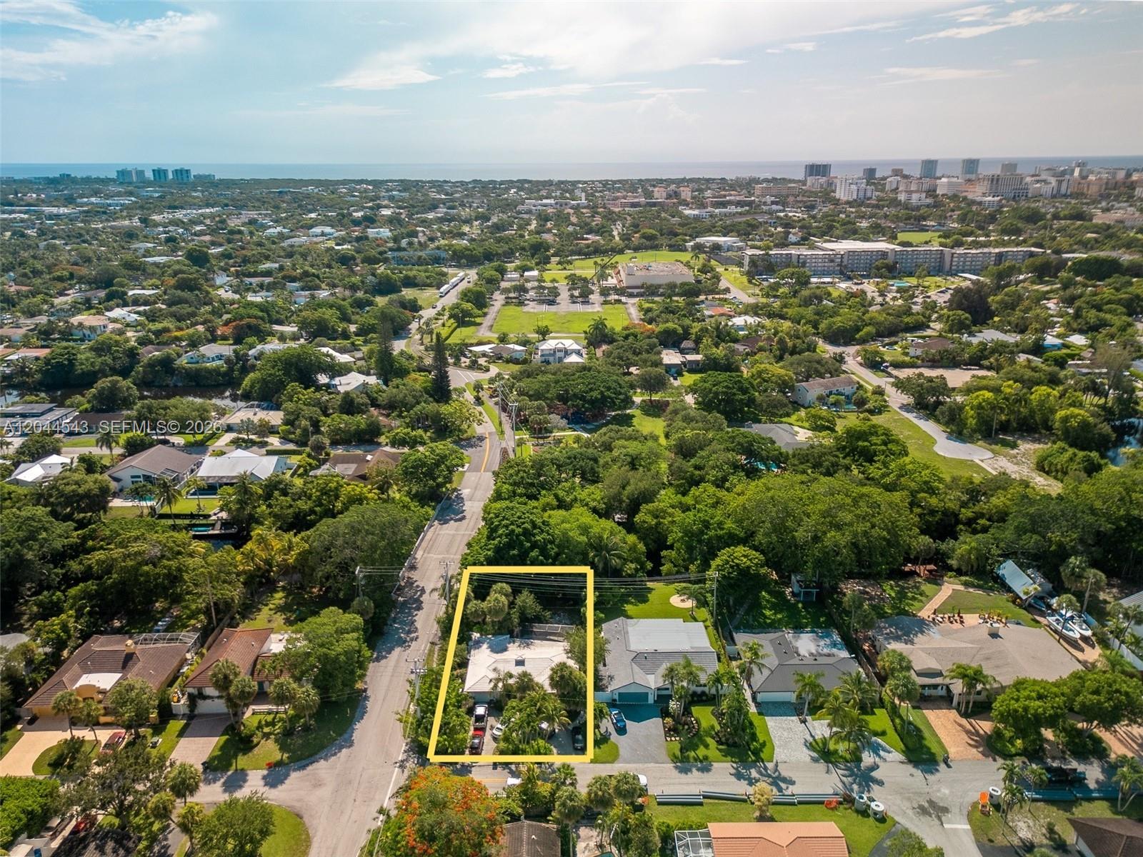 An aerial view shows a residential property highlighted in yellow within a suburban neighborhood — 698 NW 7th Ave, Boca Raton FL 33486, BOCA RATON, FL