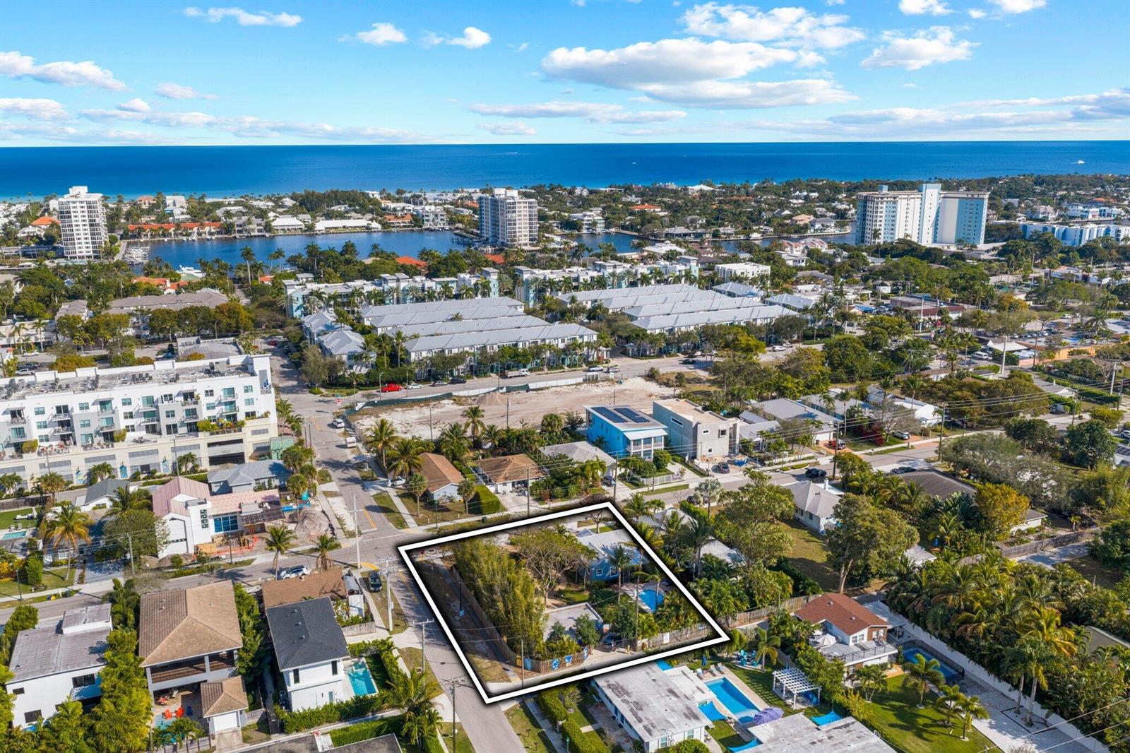 An aerial view highlights a residential lot with a house and pool in a coastal neighborhood — 304 SE 4th Avenue, Delray Beach FL 33483, DELRAY BEACH, FL