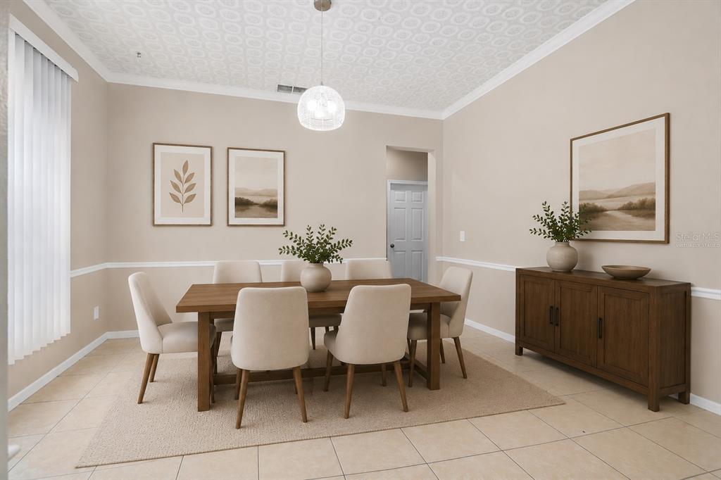 A dining room features a wooden table, six upholstered chairs, a sideboard, and a patterned ceiling — 13821 AMBERLEIGH ROAD, ORLANDO, FL