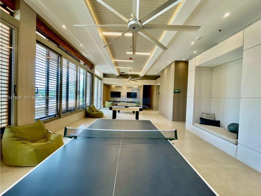 A game room features a ping pong table, a pool table, and built-in bench seating — 114 Cra. 2 #114-03 # 121, FL