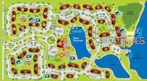 This is a site map showing the layout of a residential community with buildings and lakes — 602 NEW PROVIDENCE PROMENADE UNIT 17602, DAVENPORT, FL