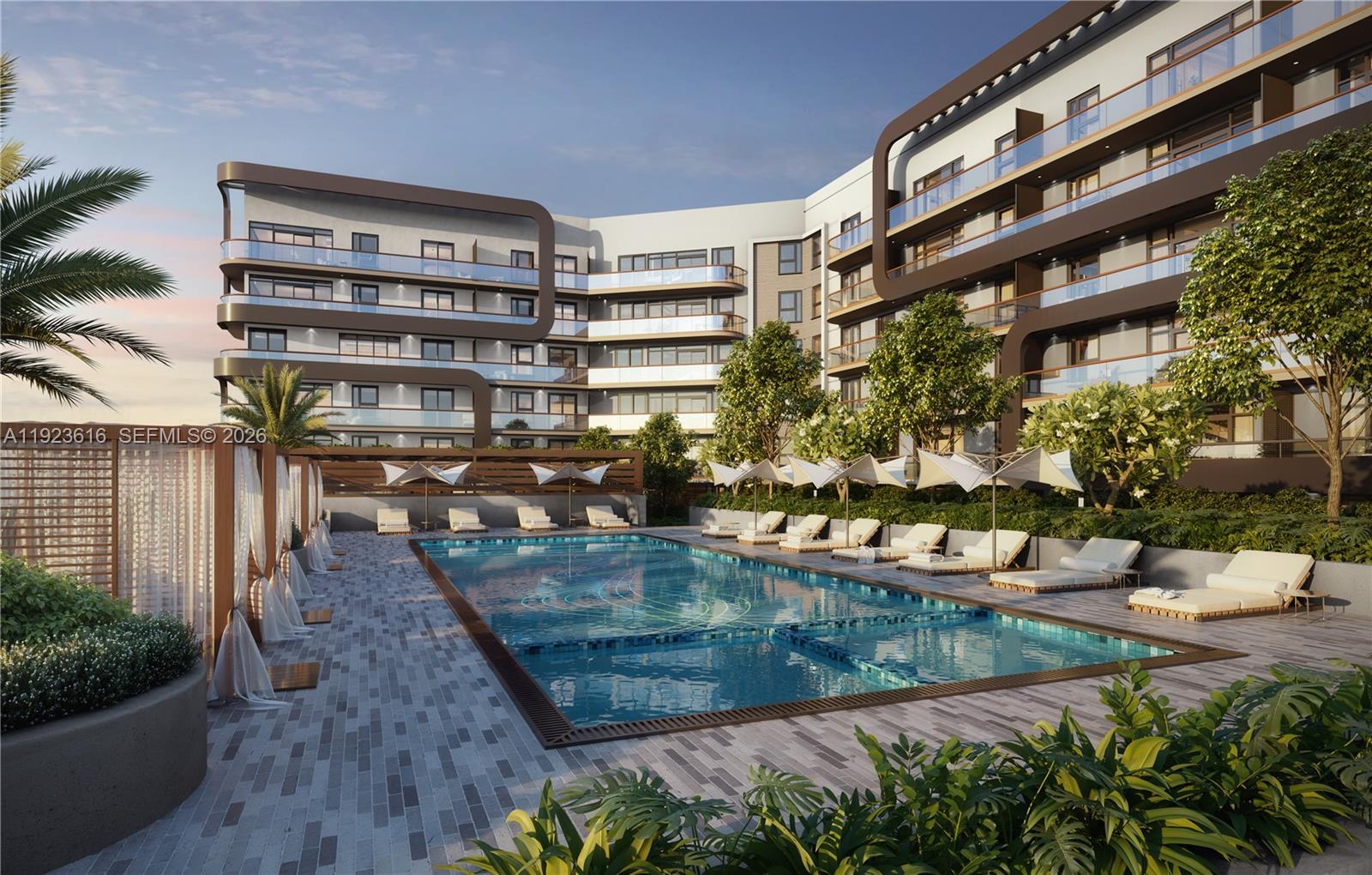 A rendering of a modern apartment building exterior featuring a swimming pool and lounge chairs — 218 SE 7th St # 612A, Hallandale Beach FL 33009, HALLANDALE BEACH, FL