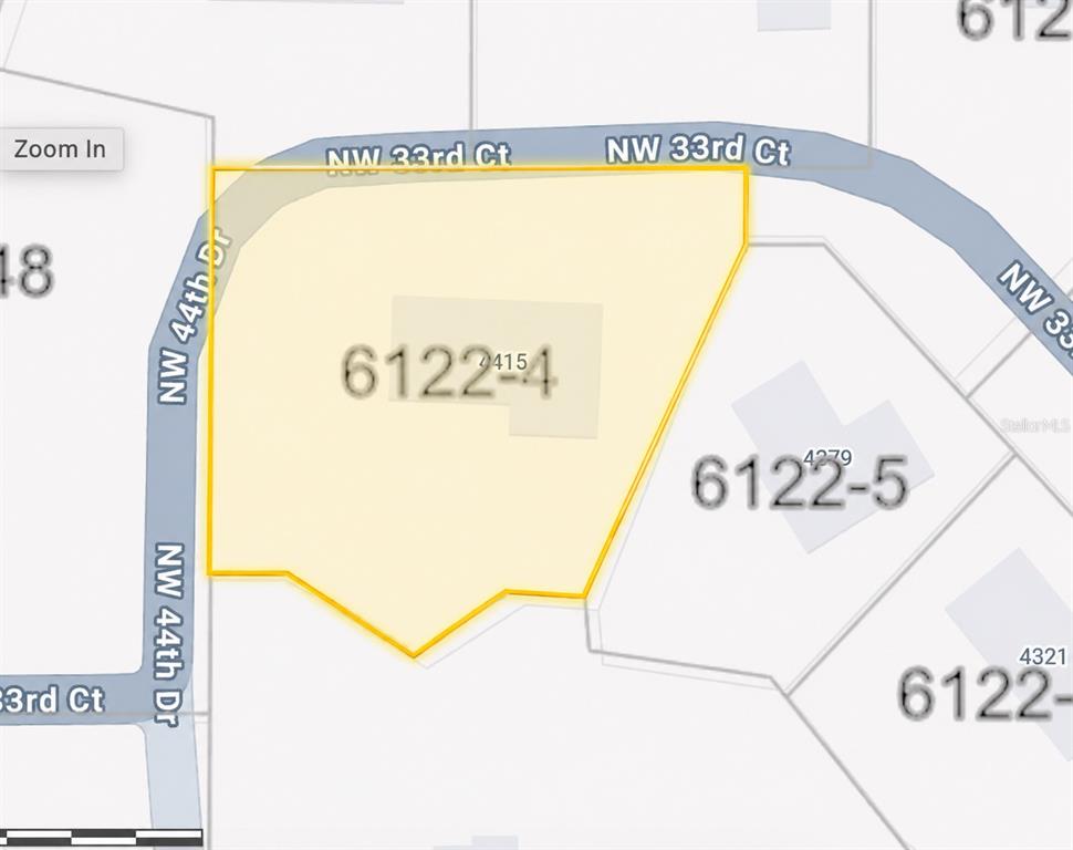 This is a map showing a highlighted property lot located at a street intersection — 4415 NW 33RD COURT, GAINESVILLE, FL