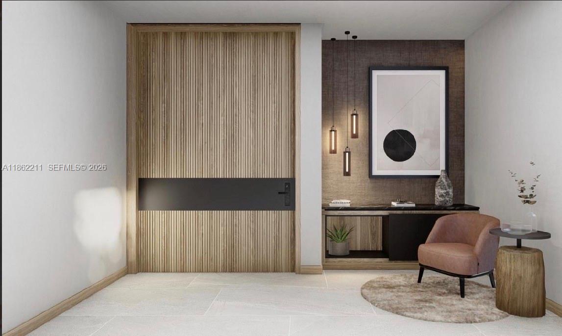 This rendering shows a modern entryway with a slatted wood door, accent wall, and armchair — 2664 SW 17th Ave, Miami FL 33133, MIAMI, FL