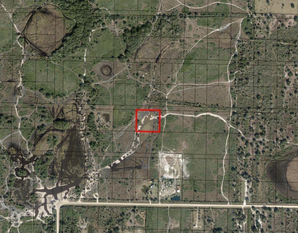 This is an aerial map showing a red square highlighting a specific plot of land — 0 NW 308th Street, Okeechobee FL 34972, OKEECHOBEE, FL