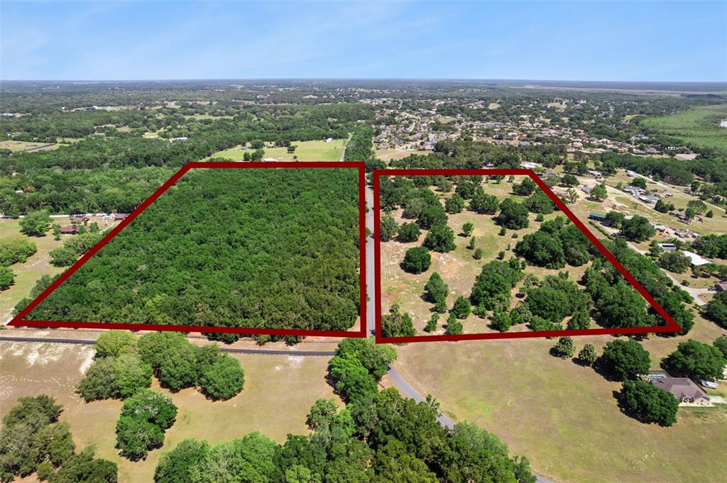 An aerial view shows two adjacent plots of land separated by a road — 0000 BERTSVILLE & GRIFFIN VIEW ROAD, LADY LAKE, FL