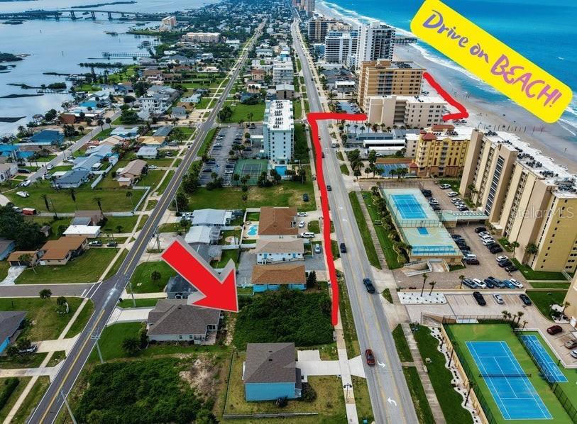 This aerial map shows a coastal neighborhood with beach access, multi-story buildings, and tennis courts — 3826 S ATLANTIC AVENUE, DAYTONA BEACH SHORES, FL