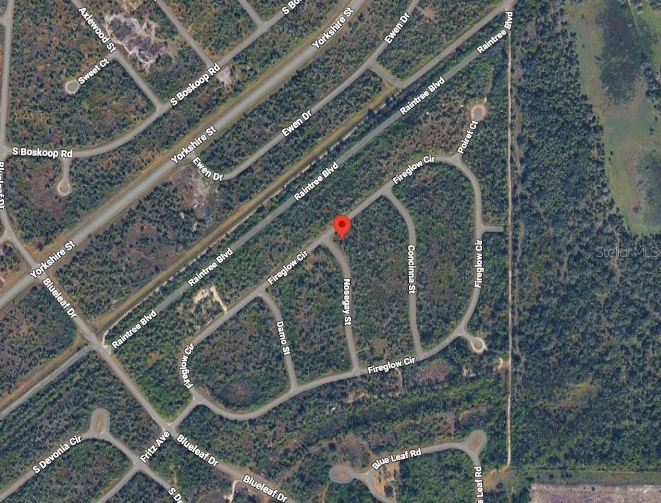 This is an aerial map view of a residential neighborhood with undeveloped wooded lots — Lot 7 NOSEGAY STREET, NORTH PORT, FL