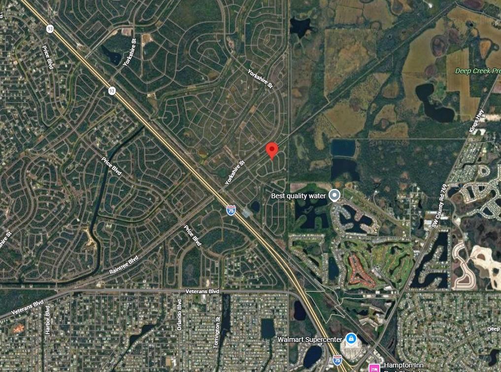 This is an aerial map view showing residential streets, a highway, and local landmarks — Lot 7 NOSEGAY STREET, NORTH PORT, FL