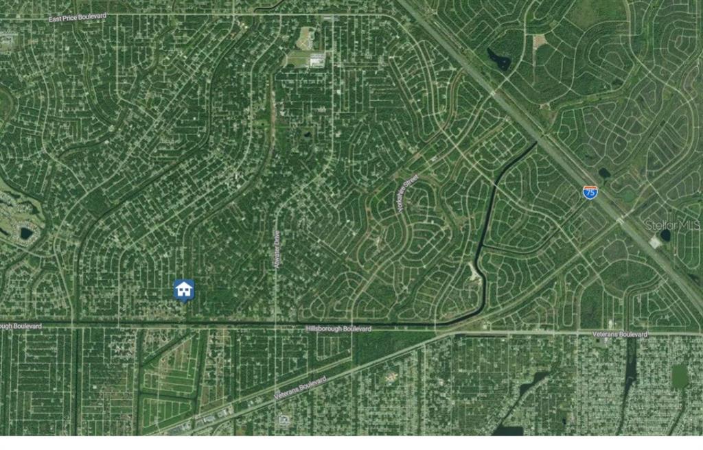 This is an aerial map showing a residential neighborhood with a highlighted property location — Lot#40 INVERNESS STREET, NORTH PORT, FL