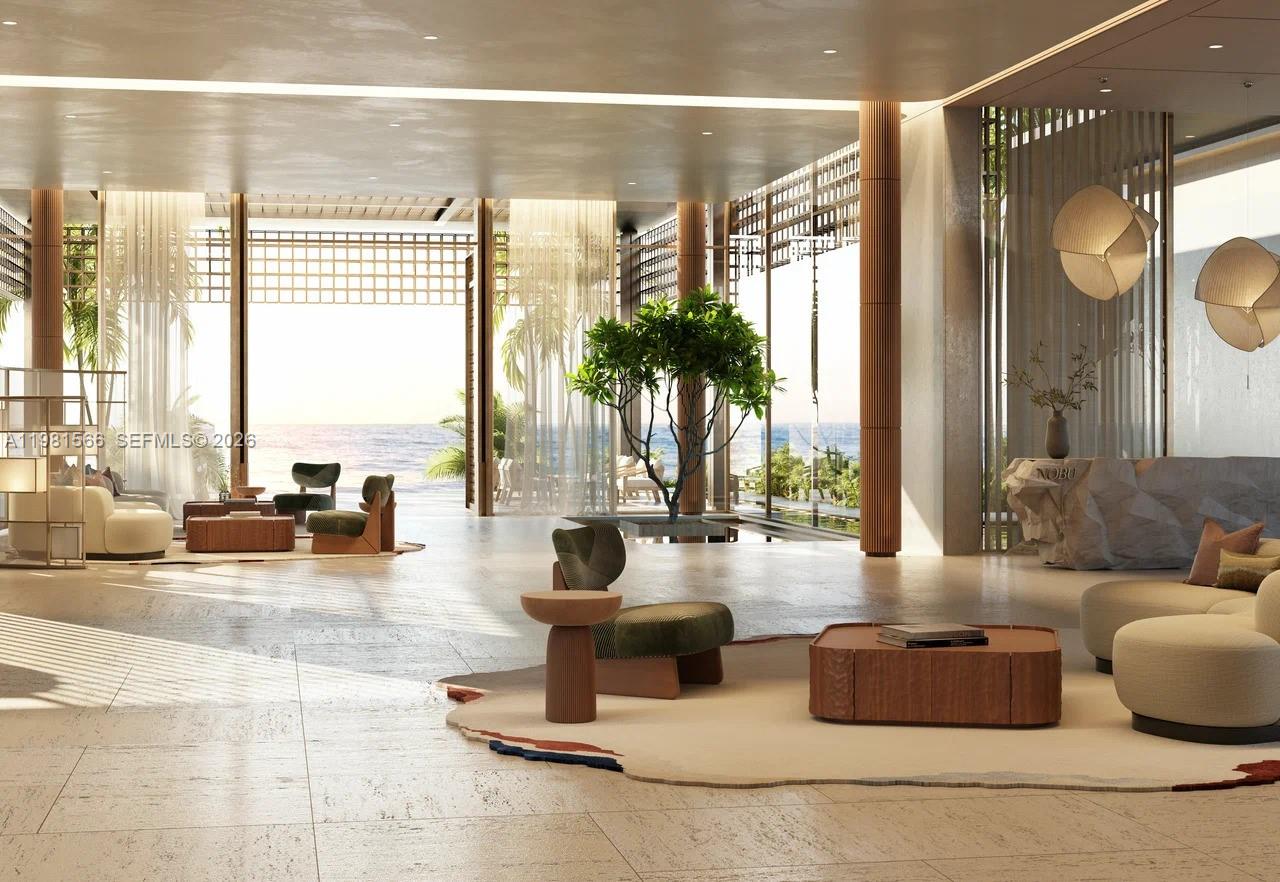 This rendering shows a modern, open-concept lobby with ocean views, stone flooring, and lounge seating — 1st Mamsha Al Saadiyat # 0, Abu Dhabi, FL