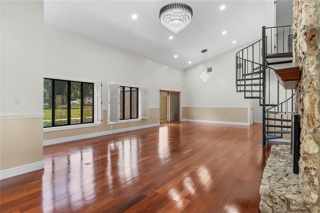 An aerial view shows a house with a metal roof, a pool, and a patio — 3261 SE 41ST PLACE, OCALA, FL