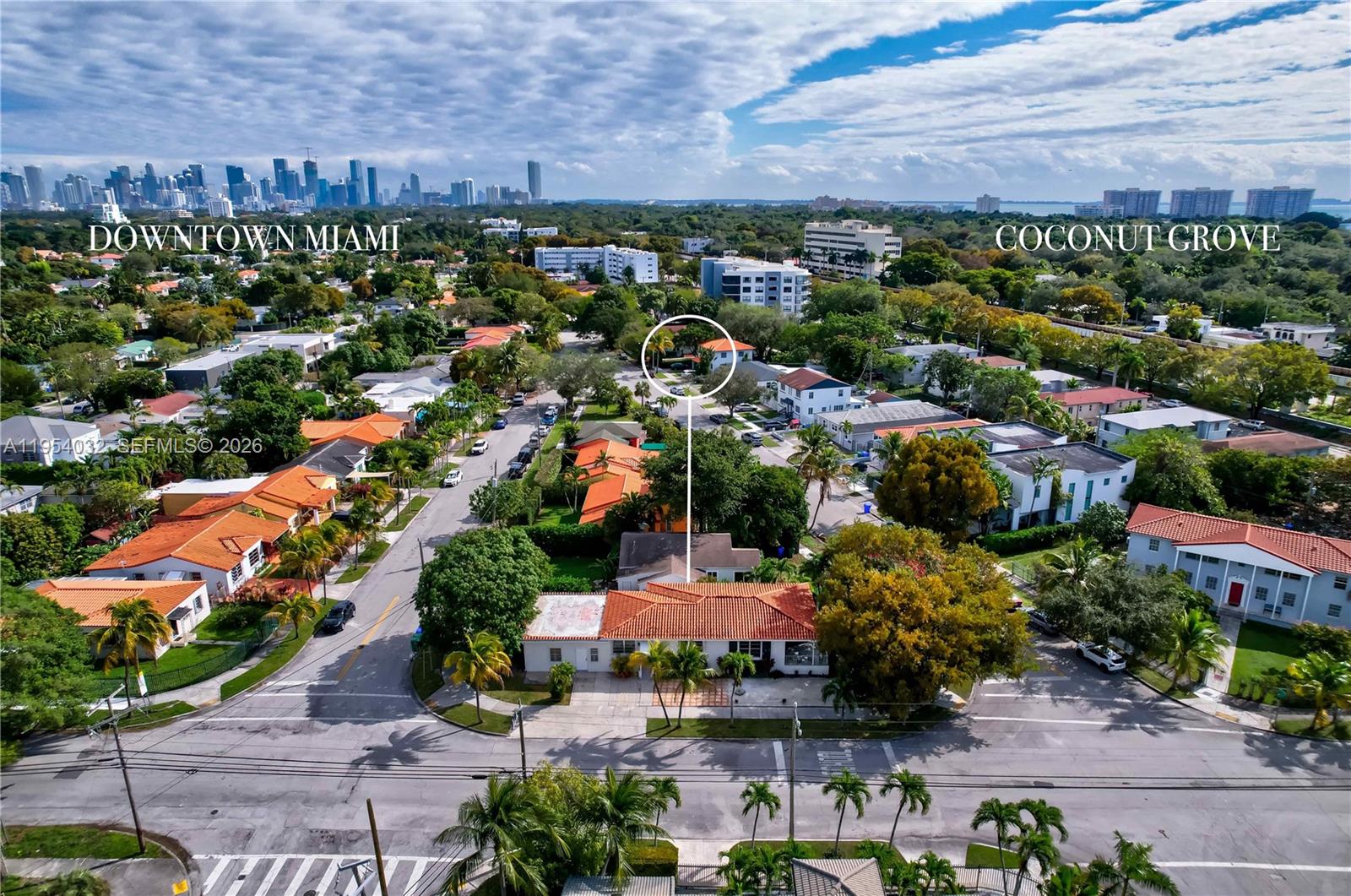 An aerial view shows a residential neighborhood with a highlighted house in the distance — 2399 SW 26th Ln, Miami FL 33133, MIAMI, FL