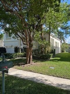 A two-story house with a large tree in the front yard and a mailbox — 5003 SW 163rd Ave, Miramar FL 33027, MIRAMAR, FL