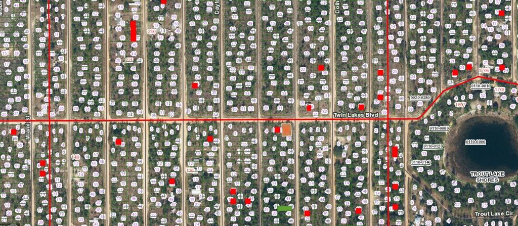 This is a satellite map showing a grid of residential land parcels and a lake — 05-10-24-9045-0070-0010 TWIN LAKES BOULEVARD, INTERLACHEN, FL