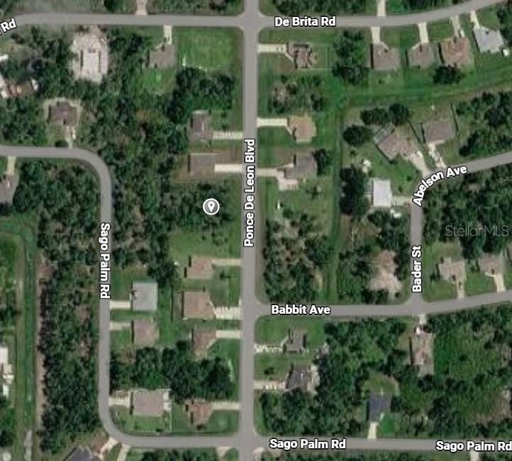 This is an aerial map view of a residential neighborhood with streets and vacant lots — PONCE DE LEON BOULEVARD, NORTH PORT, FL