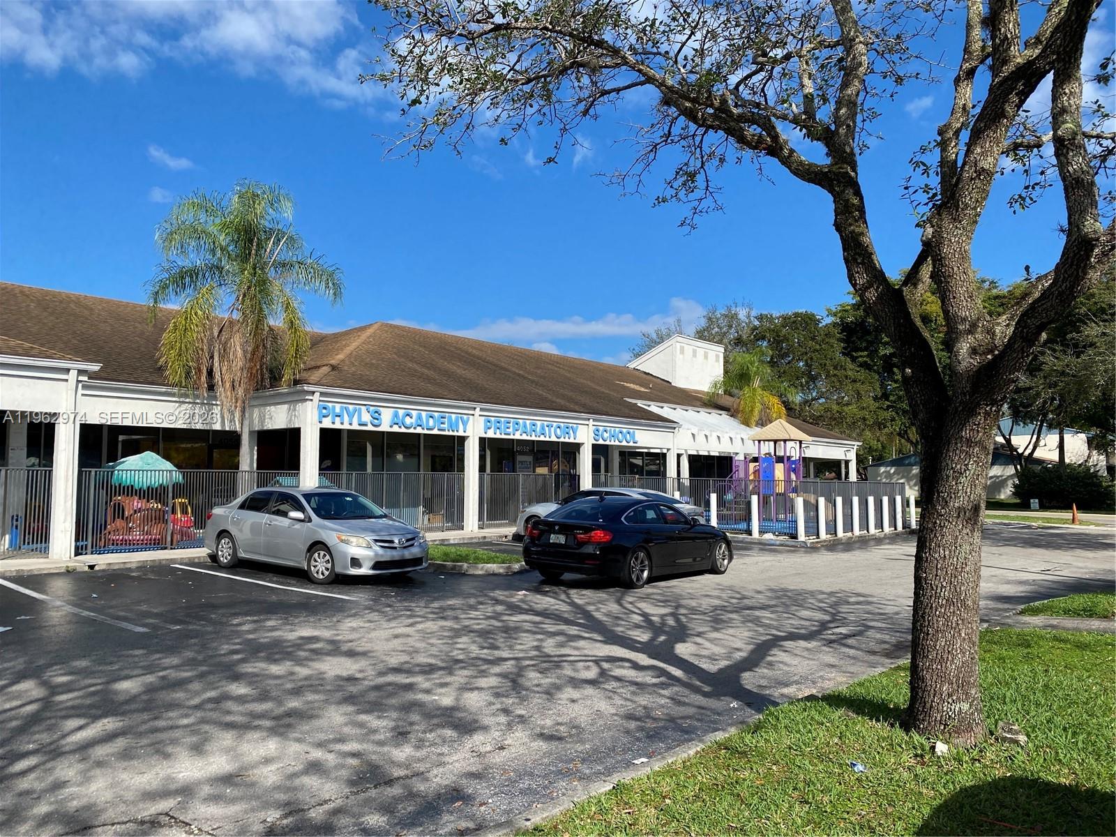 A single-story commercial building labeled Phyl's Academy Preparatory School with a parking lot in front — 4040 SW 69th Ave, Miramar FL 33023, MIRAMAR, FL