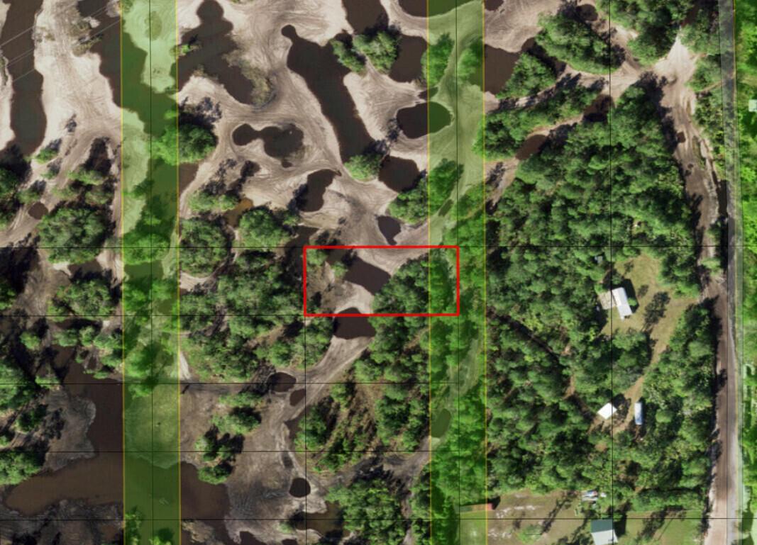 An aerial map view shows a wooded lot with scattered ponds and a red boundary outline — 0 Holopaw Groves Road, FL 34772, FL