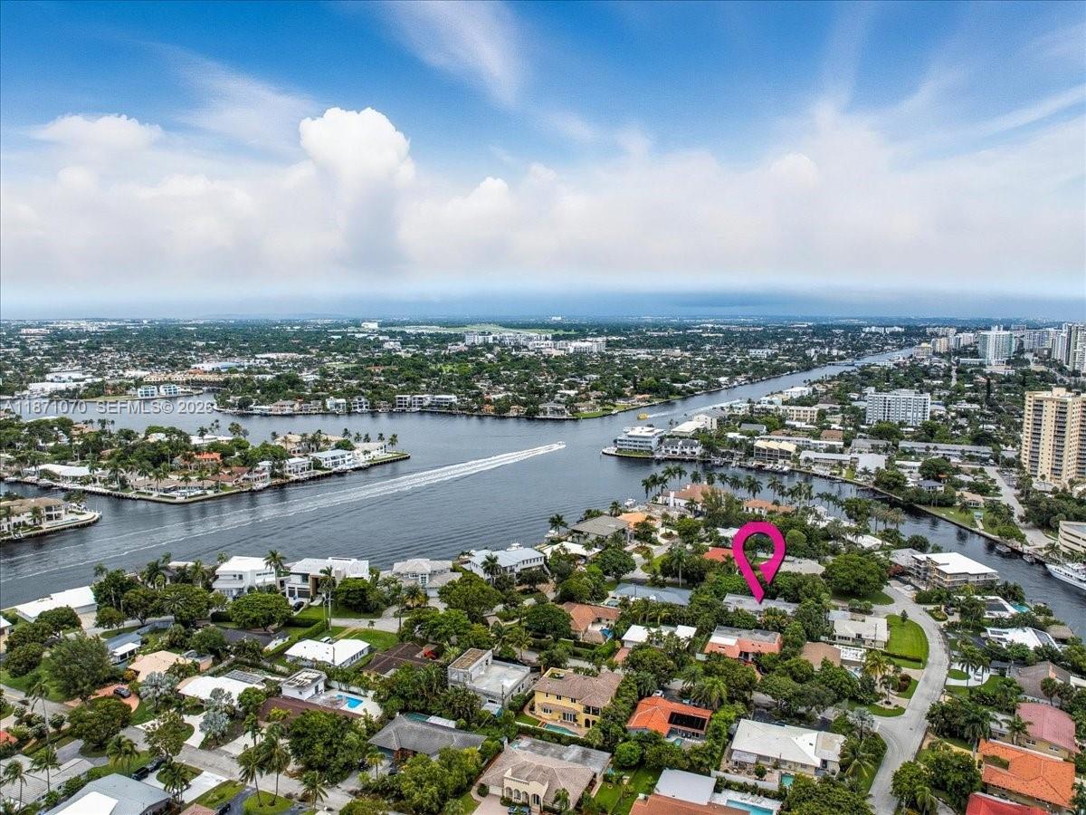 An aerial view shows a residential neighborhood with a pink house marked by a pin — 3260 Lakeview Dr, Pompano Beach FL 33062, POMPANO BEACH, FL