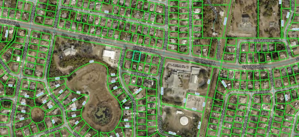 This is an aerial map showing residential property lines and street layouts — SPRING HILL DR DRIVE, SPRING HILL, FL