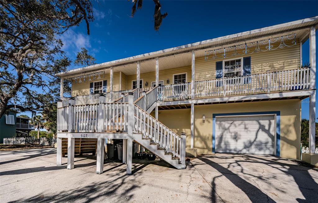 This is a floor plan showing a multi-bedroom house with a large screened porch — 5127 BAY BOULEVARD, PORT RICHEY, FL