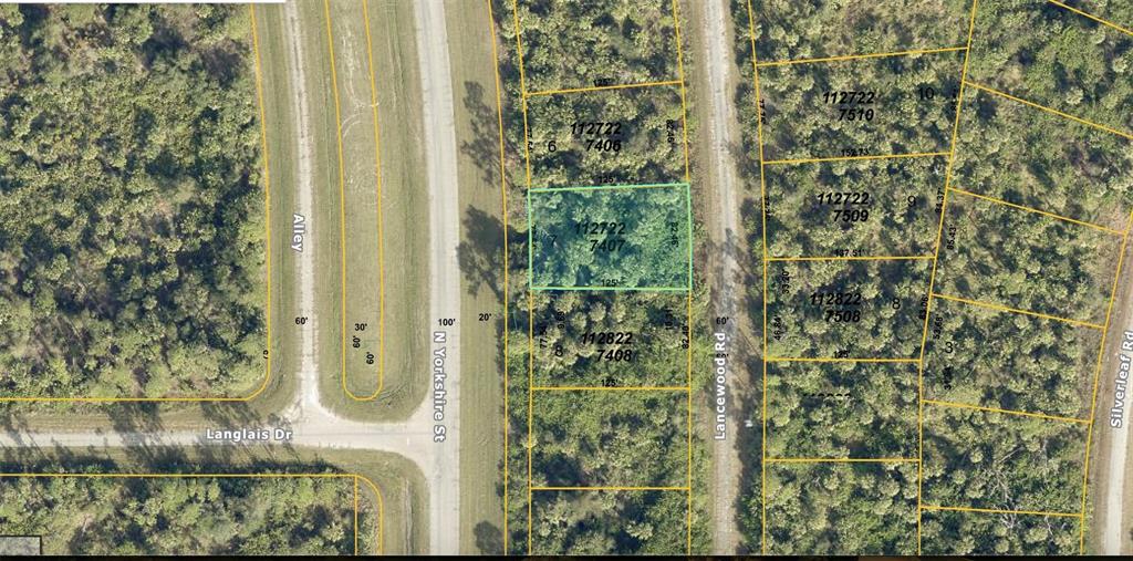 An aerial map view showing a highlighted rectangular plot of land surrounded by wooded lots — Lot 7 LANCEWOOD ROAD, NORTH PORT, FL