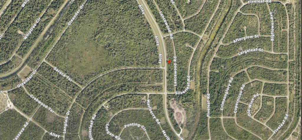 This is an aerial map showing residential streets and undeveloped land in a wooded area — Lot 7 LANCEWOOD ROAD, NORTH PORT, FL