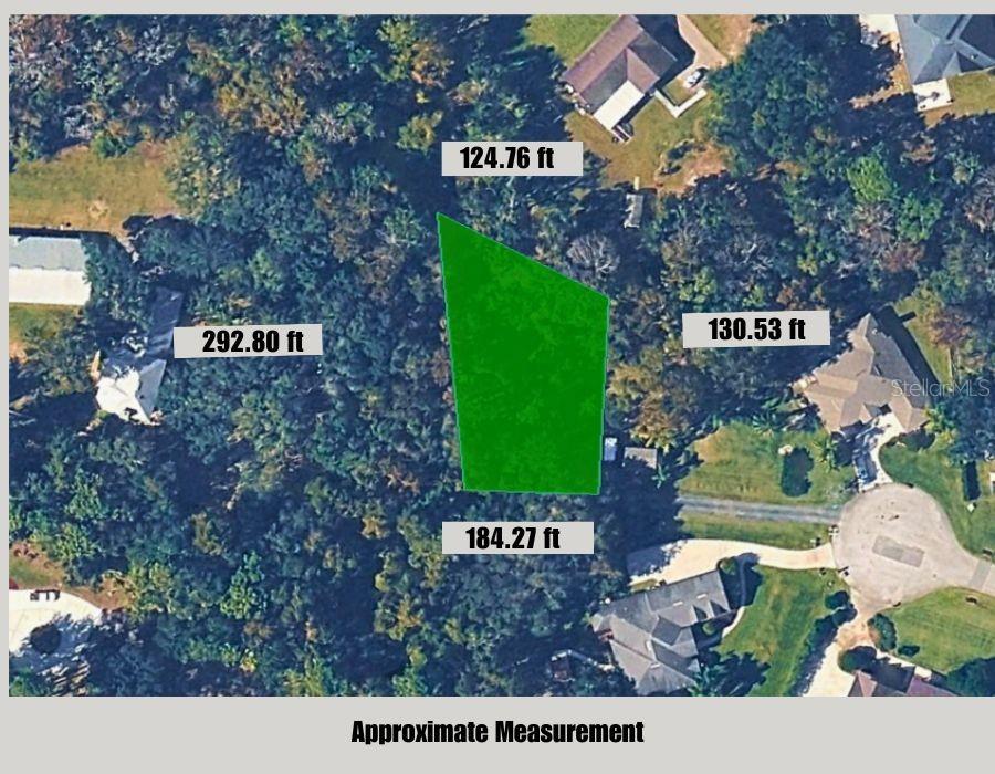 An aerial map shows a green-highlighted plot of land with its four side measurements labeled — SHANE COURT, ST AUGUSTINE, FL