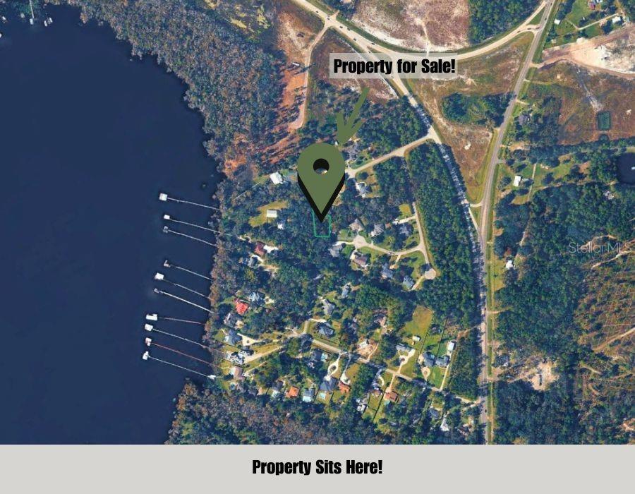 An aerial map view shows a vacant lot highlighted near a lake and residential area — SHANE COURT, ST AUGUSTINE, FL