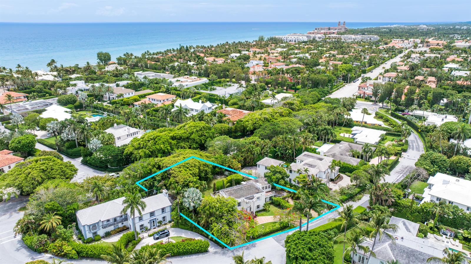 An aerial view shows a residential property with a house surrounded by lush green trees — 357 Crescent Drive, Palm Beach FL 33480, PALM BEACH, FL