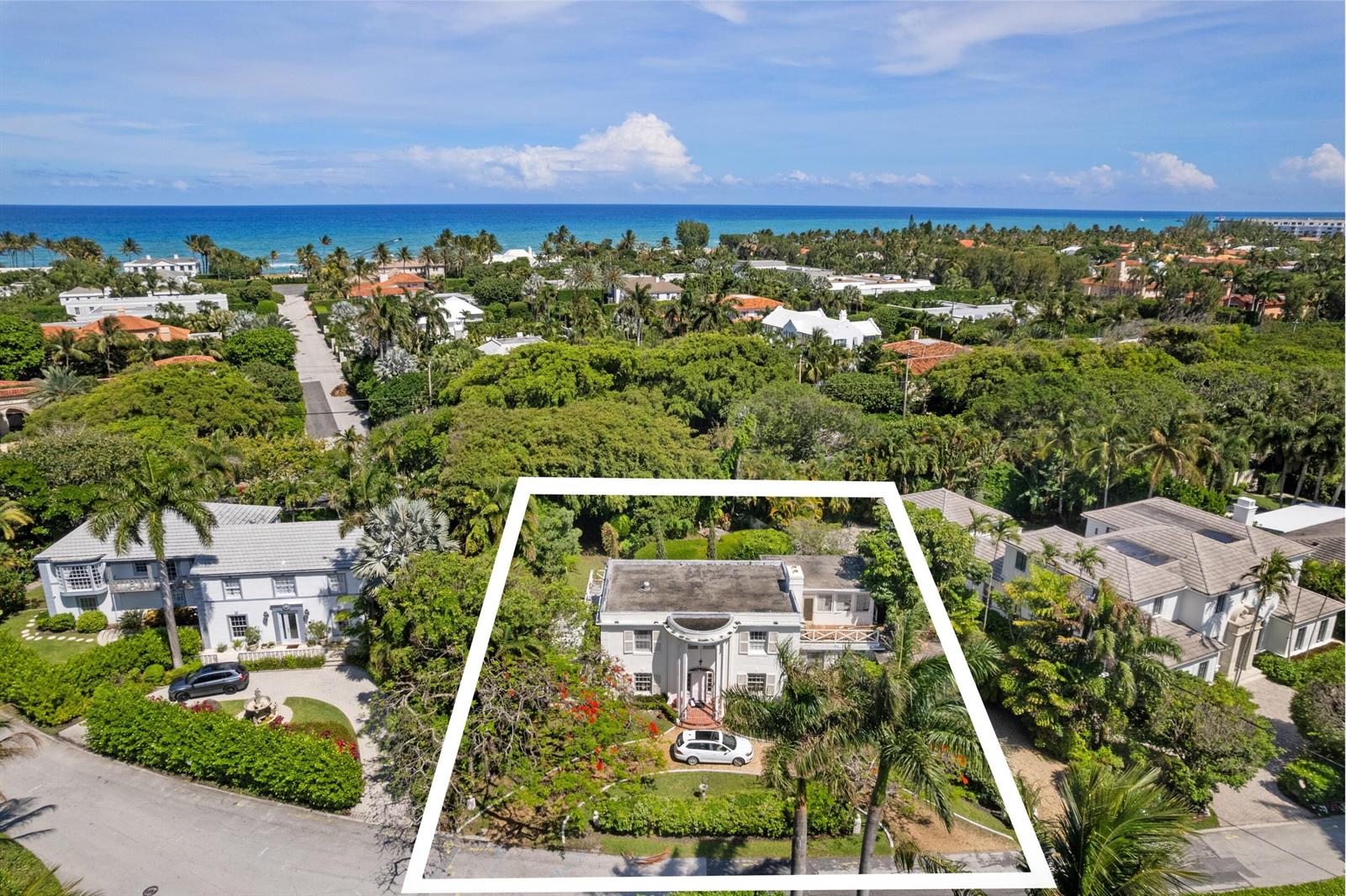 An aerial view shows a two-story white house with a circular portico and palm trees — 357 Crescent Drive, Palm Beach FL 33480, PALM BEACH, FL