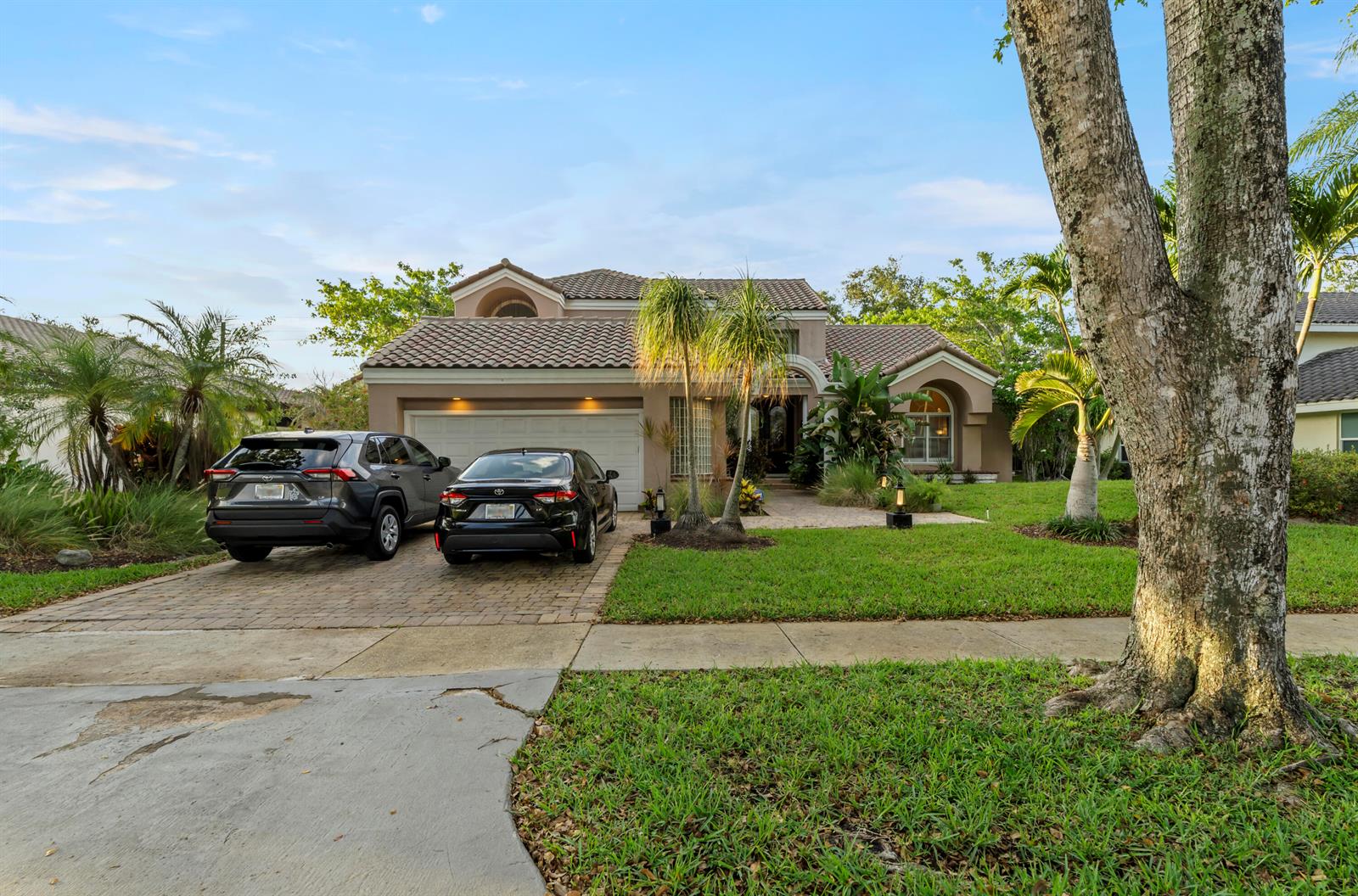An aerial view shows a residential neighborhood with a marked house near a main road — 2683 NW 49th Street, Boca Raton FL 33434, BOCA RATON, FL
