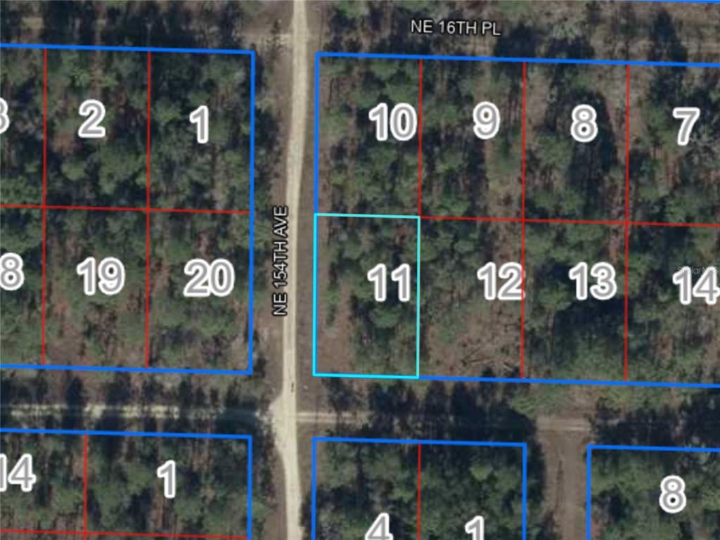 This is an aerial map showing a vacant lot highlighted in blue among other parcels — NE 15TH LN LOT 11, WILLISTON, FL