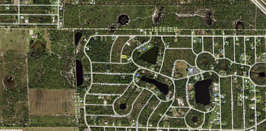 This is an aerial map view of a residential neighborhood with a highlighted property lot — 12088 VENETIAN STREET, PORT CHARLOTTE, FL
