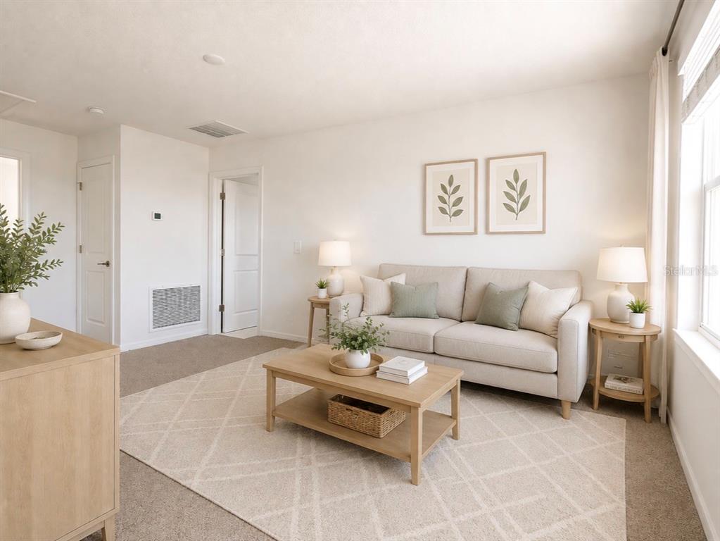 A living room features a beige sofa, wooden coffee table, and two framed botanical prints — 924 SERCHIO STREET, HAINES CITY, FL