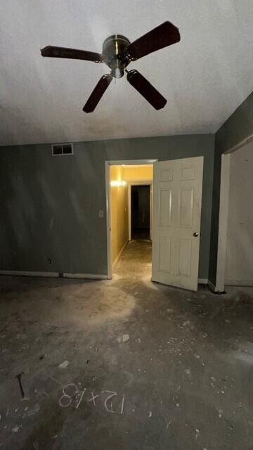 An unfinished room with a ceiling fan, gray walls, and a white interior door — 3162 N Pine Island Road, Sunrise FL 33351, SUNRISE, FL