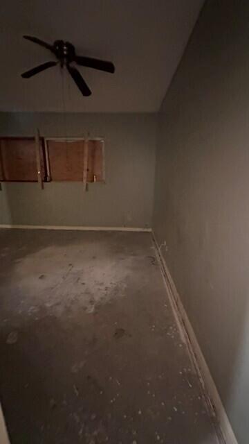 An empty room with gray walls, a ceiling fan, and bare concrete flooring — 3162 N Pine Island Road, Sunrise FL 33351, SUNRISE, FL